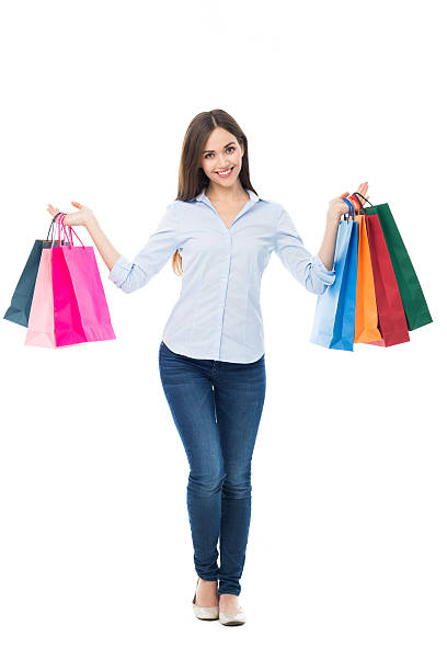 istock Young woman with shopping bags 466202676
