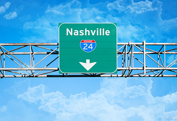 Nashville Interstate 24 Sign An elevated overhead highway sign. It reads "Nashville" and has an Interstate 24 shield above an arrow pointing downward. tennessee road sign stock pictures, royalty-free photos & images