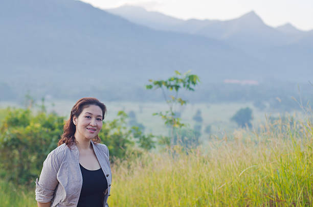 istock Pretty woman enjoying nature 466203975