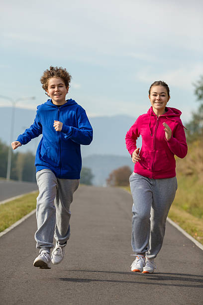 istock Young people running outdoor 466207616