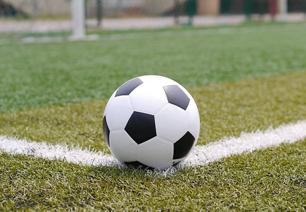 istock soccer football in Artificial turf 466207928