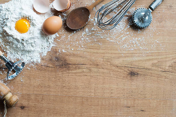 Baking ingredients Fresh ingredients and cooking utensils on rustic table italian cookie stock pictures, royalty-free photos & images