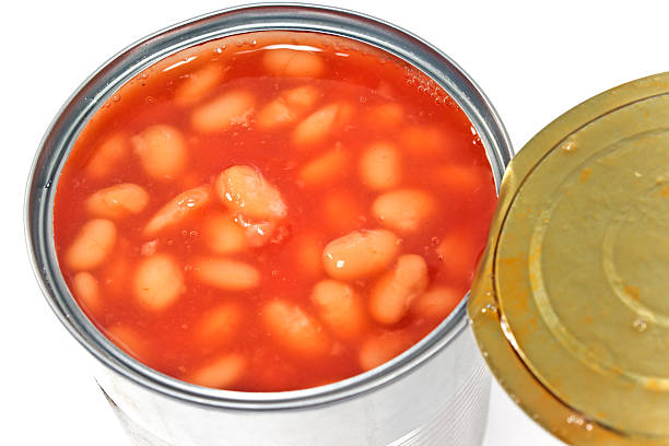 istock Open tin can of beans on white 466209288