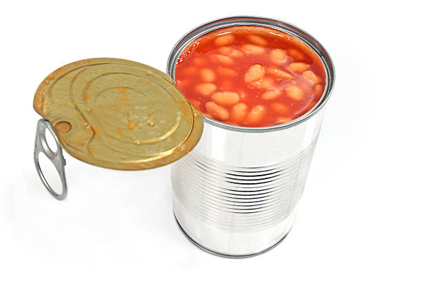 istock Open tin can of beans isolated on white 466209290