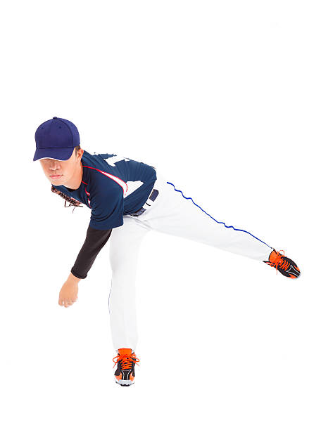 istock Baseball pitcher trolling a ball in a white background 466210045