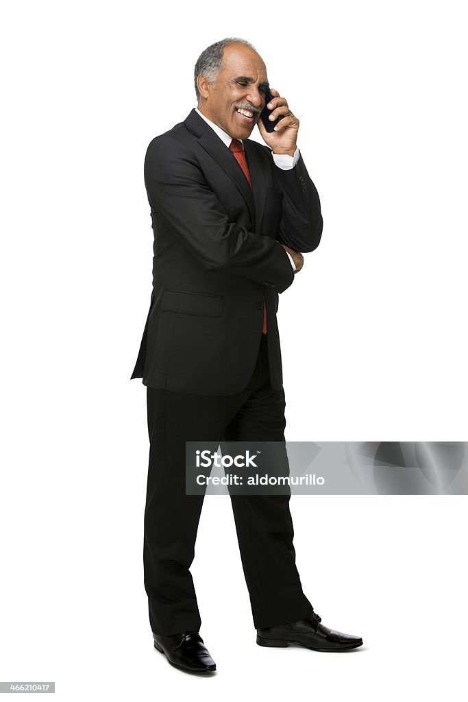Latin business executive no telefone celular - Foto de stock de Corpo inteiro royalty-free