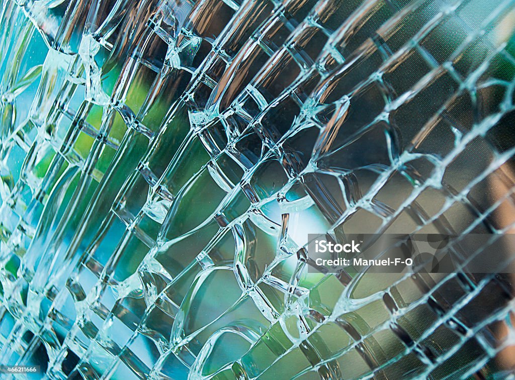 Broken window glass Detail of glass window car cracked by an accident 2015 Stock Photo