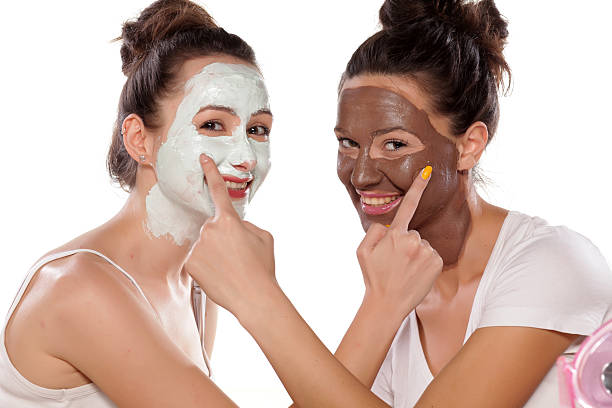 istock Two smiling young women with masks 466213166