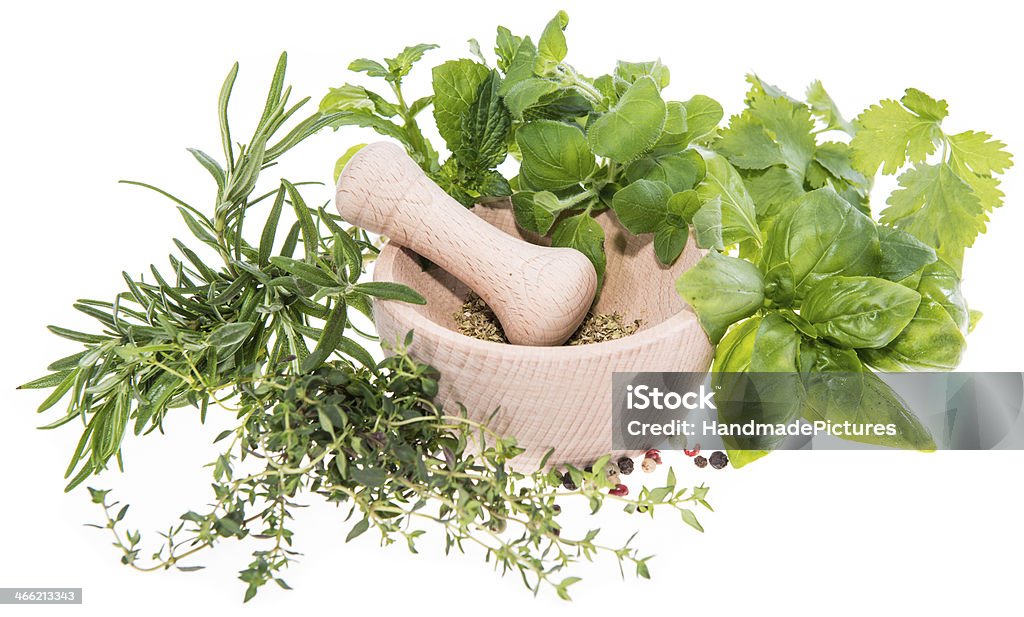 Fresh Herbs (isolated on white) Some fresh Herbs in a wooden bowl isolated on white background Basil Stock Photo