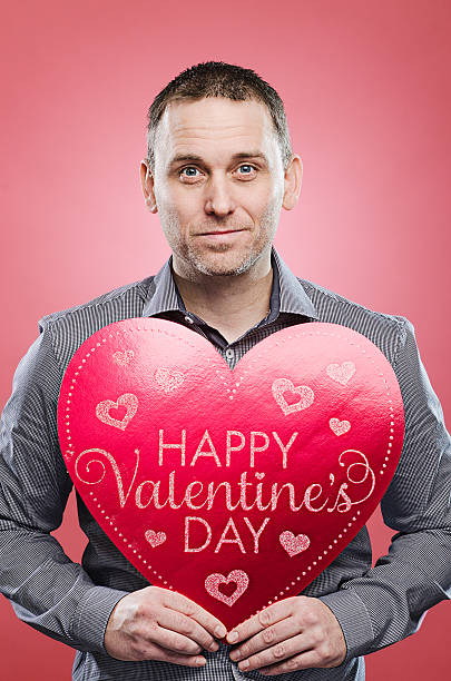 istock Man with Valentine's Day heart 466214393
