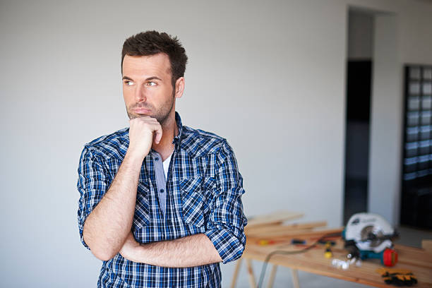 Portrait of thoughtful manual worker