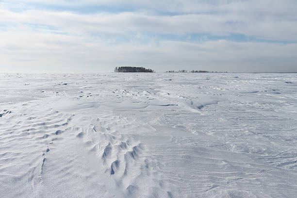 istock Way to the island on the frozen river 466215762
