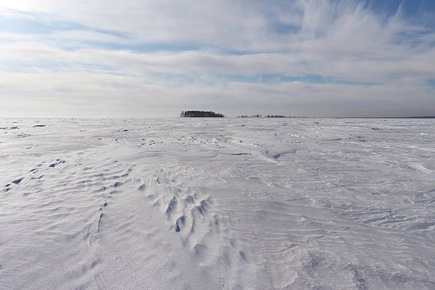 istock Way to the island on the frozen river 466215928