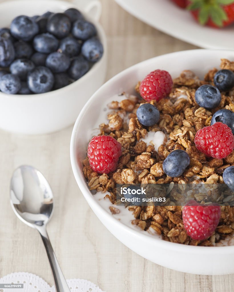 muesli with berries muesli with berries on table Blueberry Stock Photo