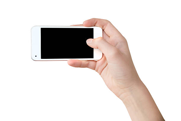 han sosteniendo un teléfono como para un "selfie" pantalla en blanco - mano fotos fotografías e imágenes de stock