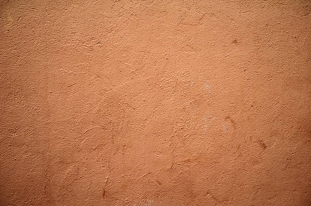 istock Texture of old wall covered with brown stucco 466221306