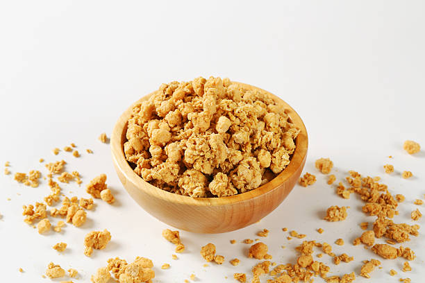 istock Mixture of nuts in a wooden bowl 466221419