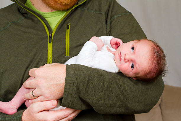 istock Dad and Newborn Baby Boy 466224449