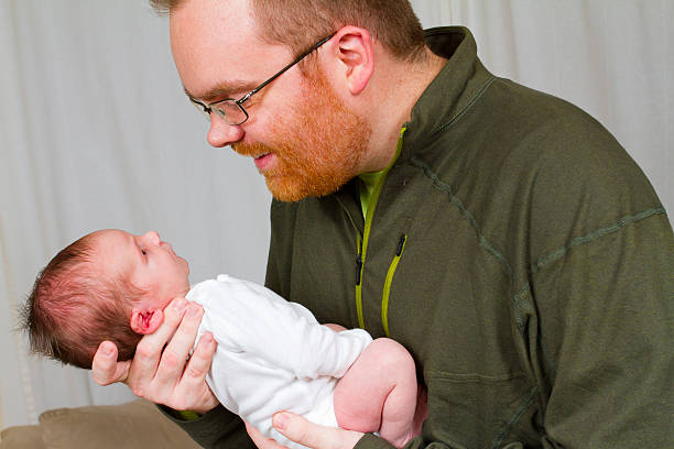 istock Dad and Newborn Baby Boy 466224615