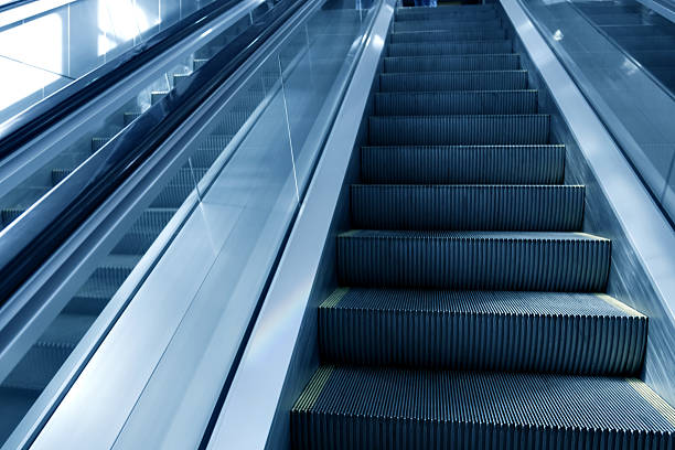 istock moving escalator in airport 466225663
