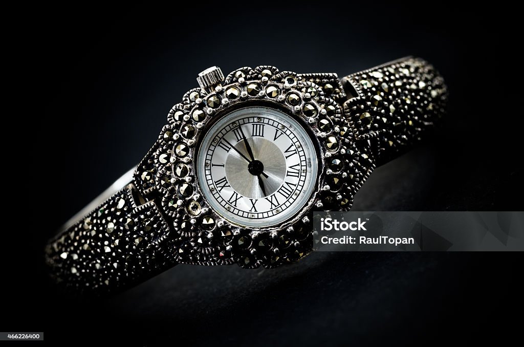 woman wristwatch woman wristwatch on black textured background 2015 Stock Photo