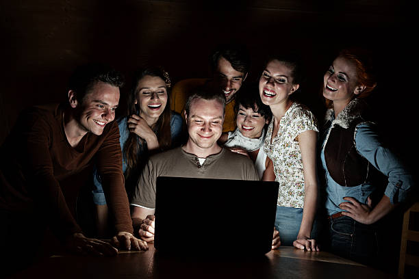 istock Group Of Friends At Laptop 466226759