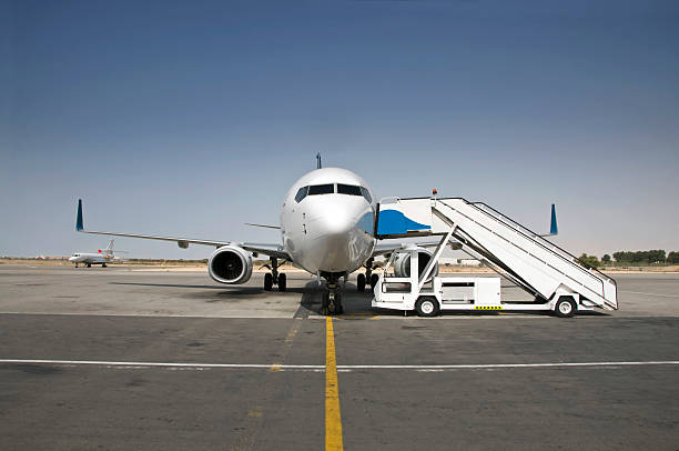 istock An aircraft being prepared for boarding 466227535