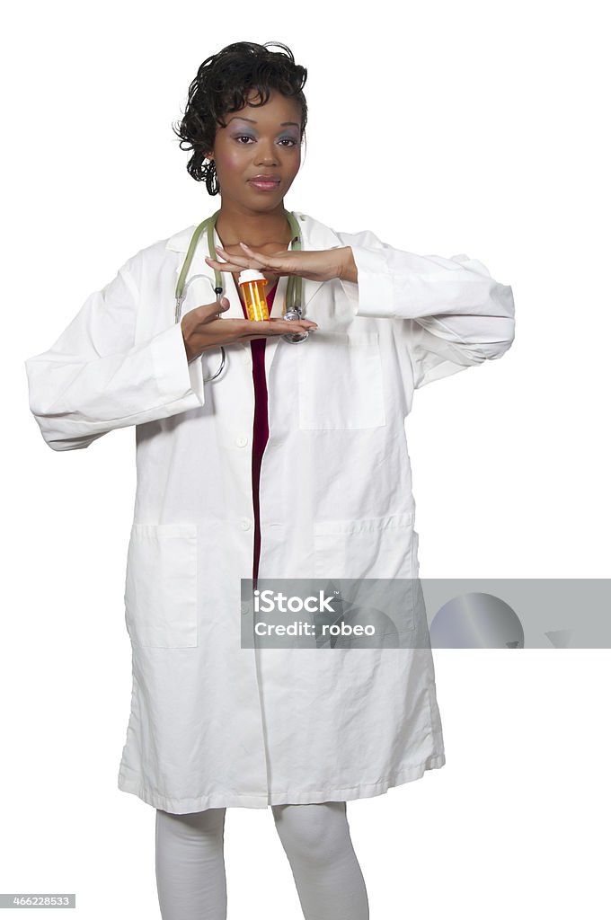 Doctor An doctor holding prescription medication in her office Adult Stock Photo