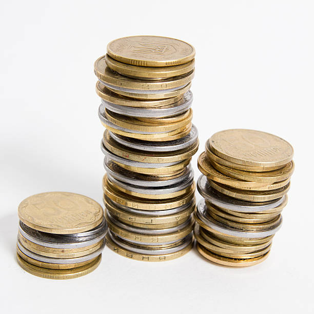 istock Columns of coins isolated on white background 466230758
