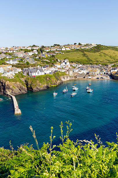 istock Cornwall fishing village harbour blue sea 466231407