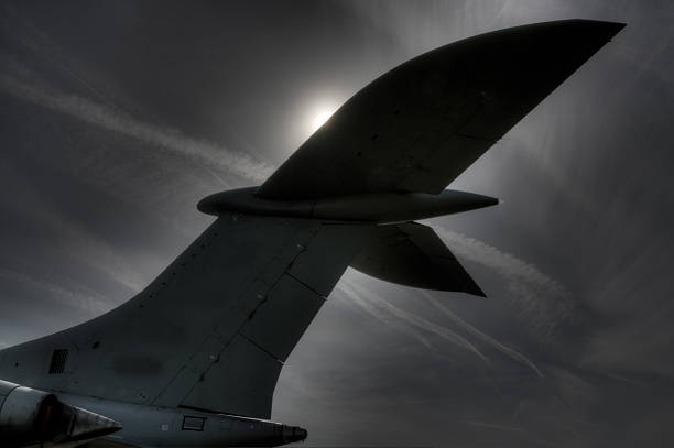 Silhouettes of Airplanes at the airport at Sunset