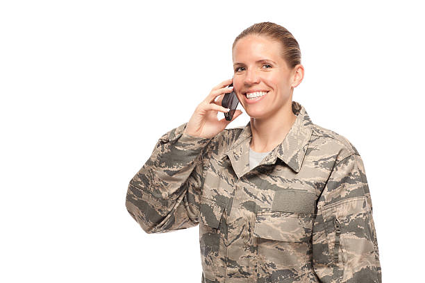 istock Happy female airman talking on mobile phone 466234662