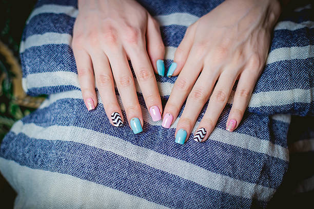 istock Girl shows blue manicure 466234864