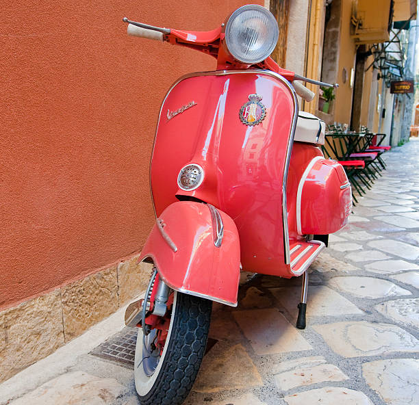 Vespa scooter on Kerkyra street. Corfu island. Greece. stock photo