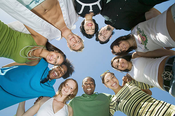istock Group of Friends Standing in a Circle 466235375