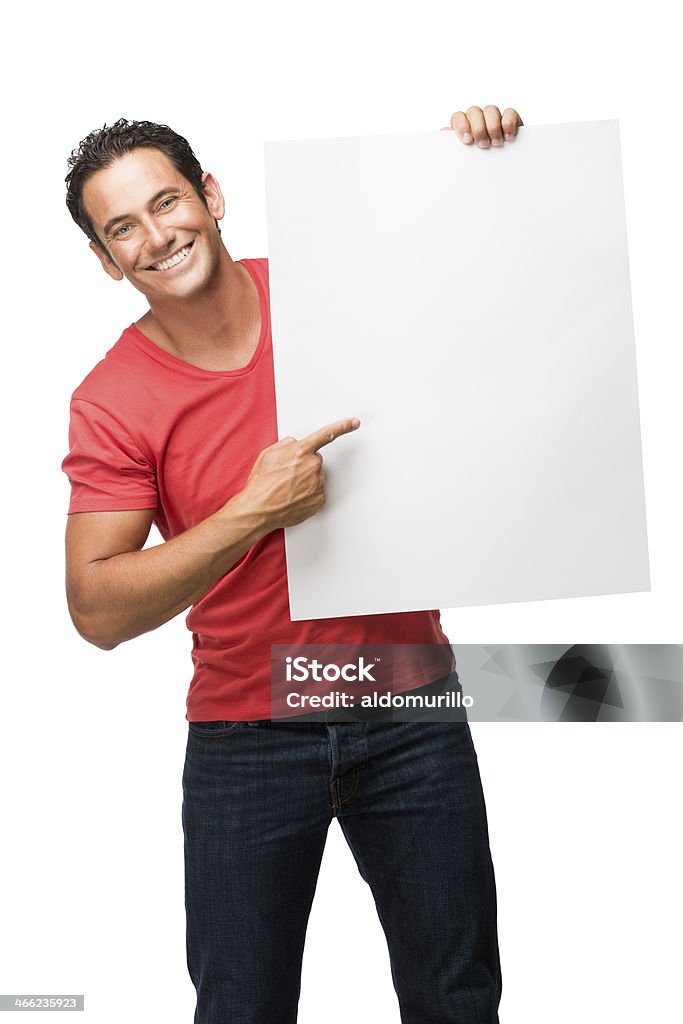 Jovem, apontando para uma placa - Foto de stock de Homens royalty-free