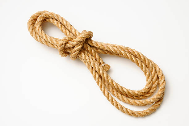 istock Isolated shot of brown rope on white background with shadow 466237155