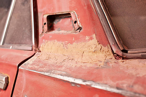 istock Layer of putty on old car 466238106