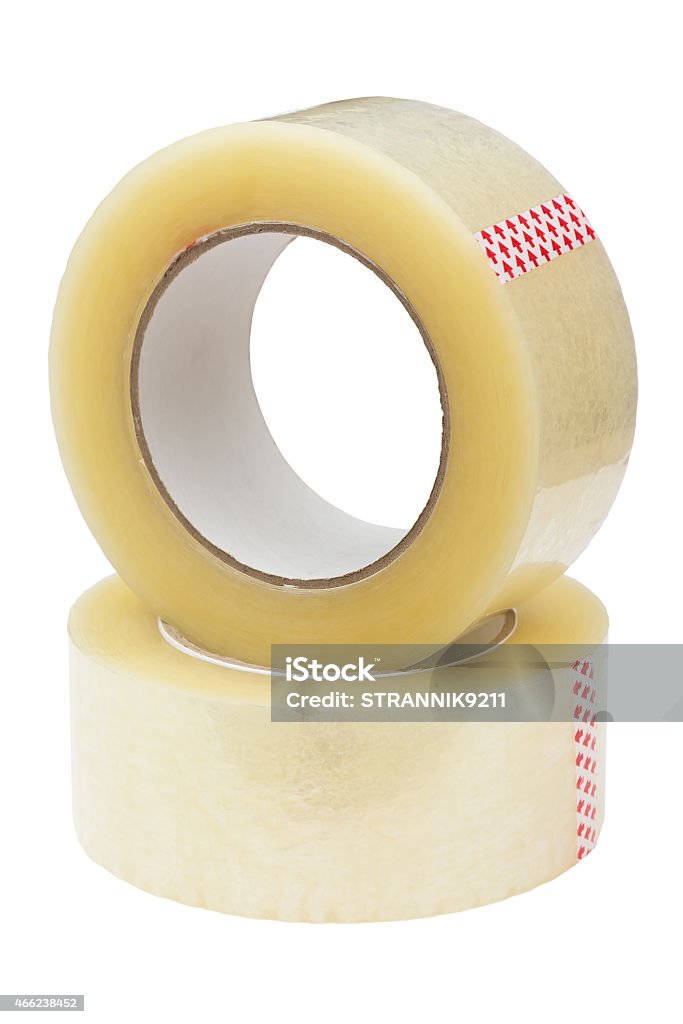 Two rolls of adhesive tape. Two rolls of adhesive tape. Isolated on white background. Clipping path is saved. Adhesive Tape Stock Photo