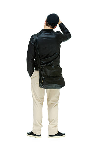 istock Casual man standing with shoulder bag 466238510