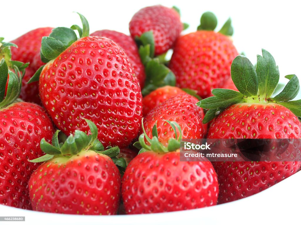 Image of fresh red strawberries, strawberry fruit / stalks, white dish Photo showing a white dish piled high with bright red strawberries, which are homegrown and freshly picked from the garden. The strawberry is a popular summer fruit that is considered to be an especially healthy snack 'super food', since they are packed with beneficial antioxidants and fibre, being a good source of vitamin C. 2015 Stock Photo Image of fresh red strawberries, strawberry fruit / stalks, white dish Photo showing a white dish piled high with bright red strawberries, which are homegrown and freshly picked from the garden. The strawberry is a popular summer fruit that is considered to be an especially healthy snack 'super food', since they are packed with beneficial antioxidants and fibre, being a good source of vitamin C. 2015 Stock Photo