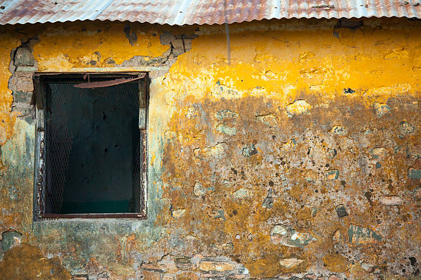 istock Old wall and window with warm colors 466238688