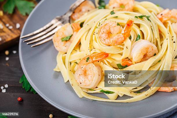 Tagliatelle With Shrimps And Parsley Stock Photo - Download Image Now - Tagliatelle, Shrimp - Seafood, Pasta