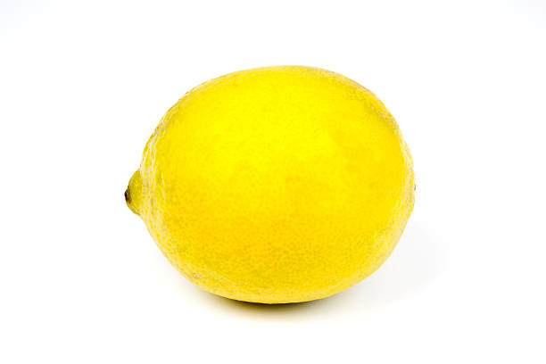 Fresh, Ripe, Yellow Lemon on White Studio Background stock photo