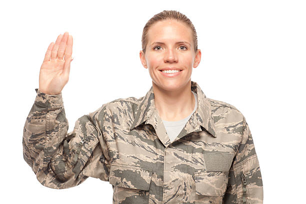 istock Female airman with hand raised for oath 466239664