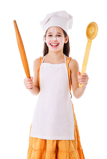 istock Smiling chef girl with ladle and rolling pin 466239837