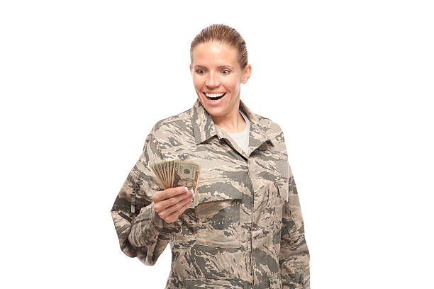 istock Excited female airman with money 466240920