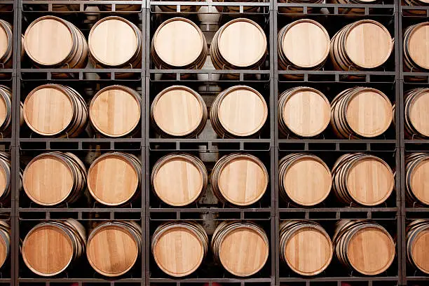 Photo of Wine barrels in stack