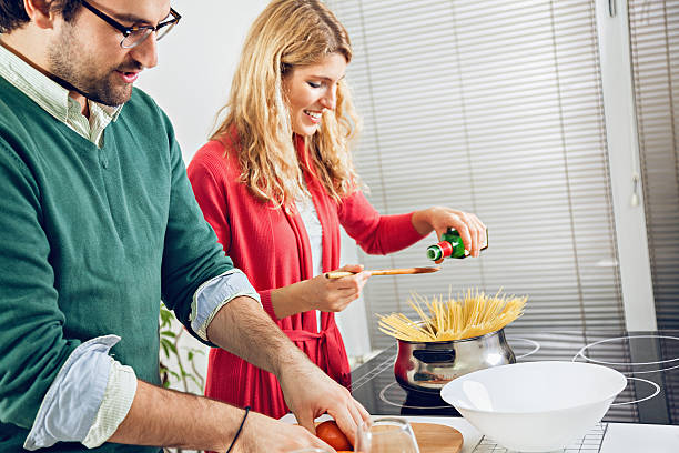 istock Beautiful couple cooking together 466243145
