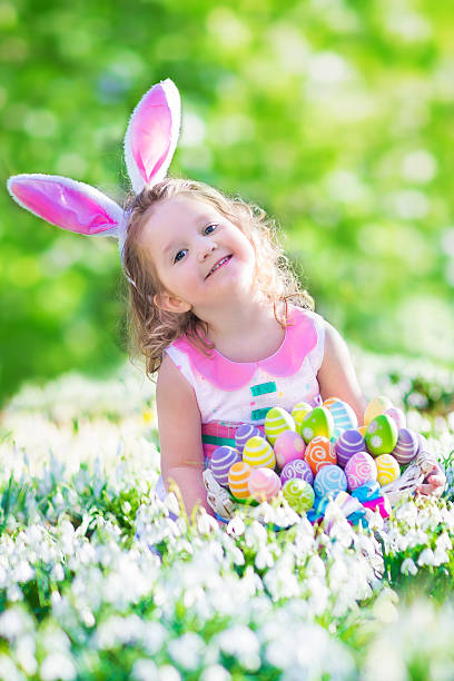 istock Beautiful little girl at egg hunt 466243960
